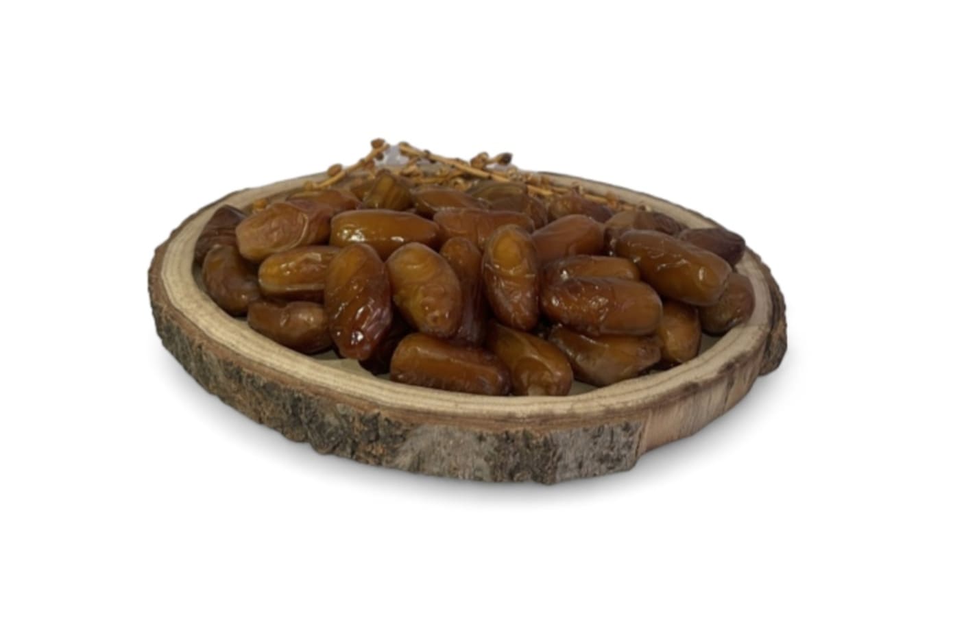 Deglet Nour Datteln mit Stein auf einer Holzscheibe – süß & aromatisch