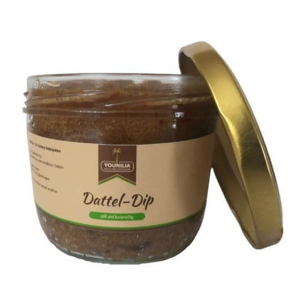 Marokkanischer Dattel-Dip in einem Glasbehälter mit goldfarbenem Deckel. Süß und nussig.